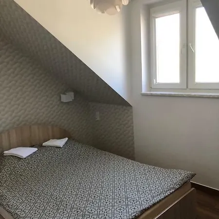 Pokoje Goscinne E&m ホームステイ