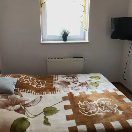 Pokoje Goscinne E&m ホームステイ Mikołajki