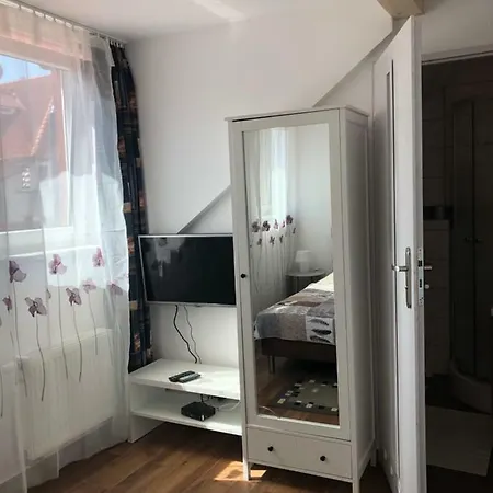 Pokoje Goscinne E&m ホームステイ Mikołajki